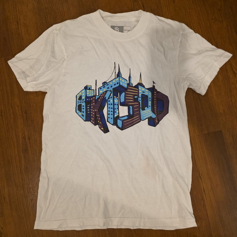 White Graphic Tee with Blue Design